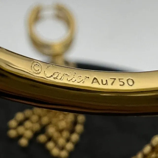 Cartier Boucles d'oreilles dorées à cercles avec franges de perles 2