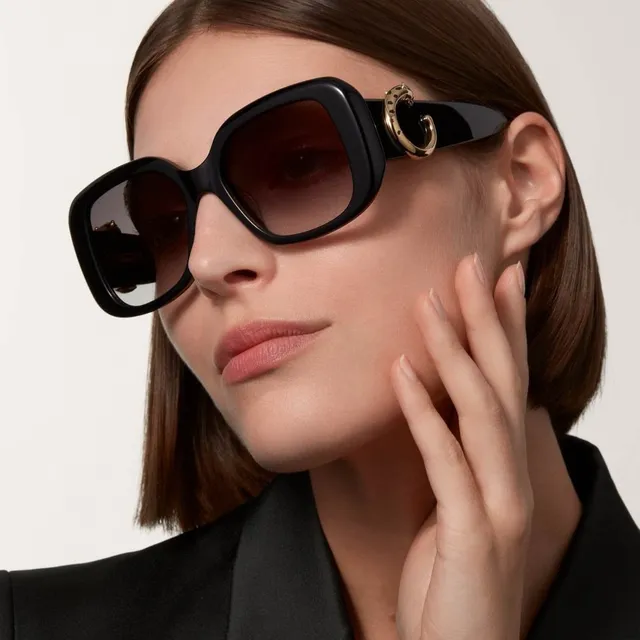 Cartier Panthère de Cartier Lunettes de soleil en acetate noir et doré 6