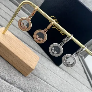 Chopard Gold Black Circular Rotating Disc Pavé Diamond Bezel Earrings