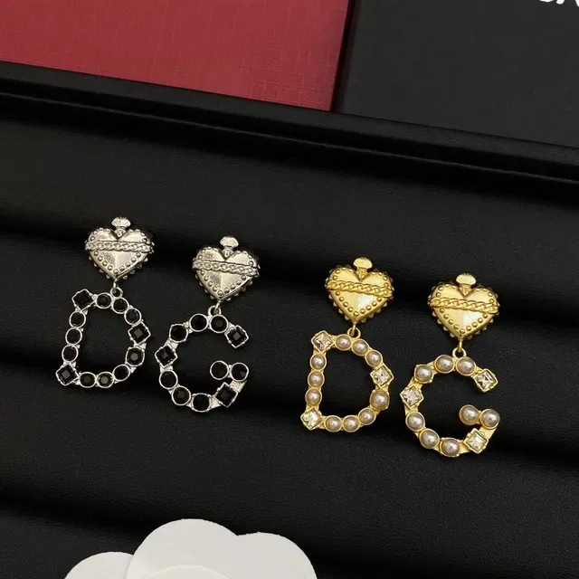 Boucles d'oreilles Dolce & Gabbana or et argent en forme de cœur avec chaîne supérieure 6