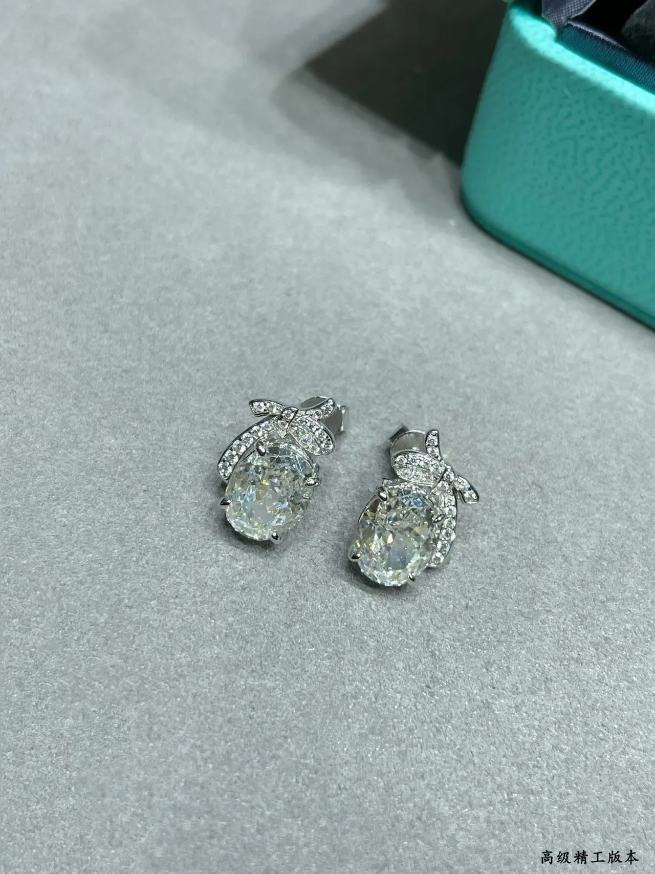 Blue Silver Bow-Motif Oval-Stone Earrings 3