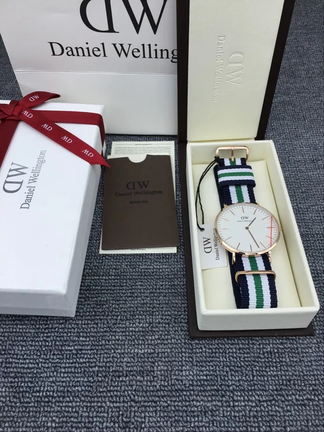 Daniel Wellington Montre à Quartz Cadran Minimaliste Blanc Marine Boîtier Or Rose 4