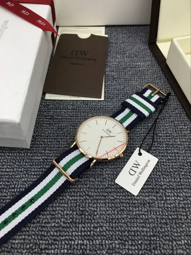 Daniel Wellington Montre à Quartz Cadran Minimaliste Blanc Marine Boîtier Or Rose 6