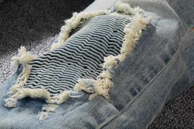 Distressed Light-Wash Blue Raw Hem Jeans 5