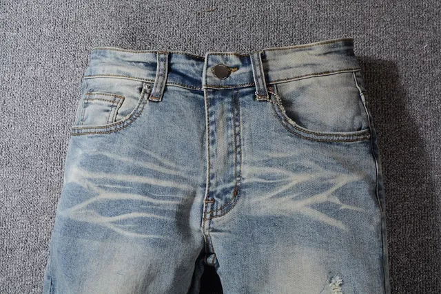 Distressed Light-Wash Blue Raw Hem Jeans 7