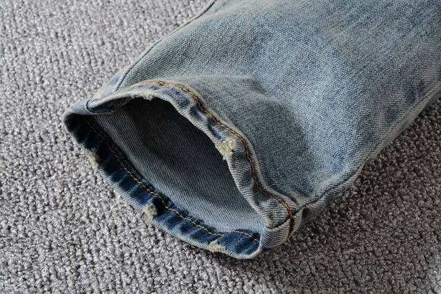Distressed Light-Wash Blue Raw Hem Jeans 10