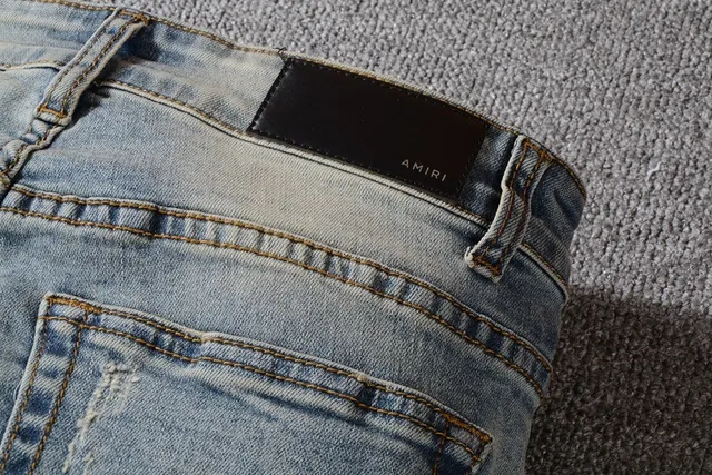 Distressed Light-Wash Blue Raw Hem Jeans 11