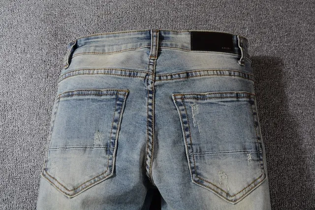 Distressed Light-Wash Blue Raw Hem Jeans 13