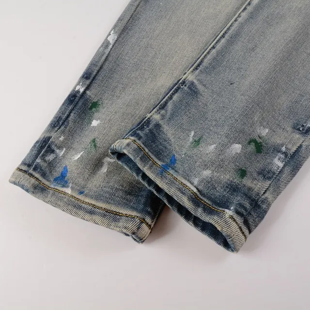 Distressed Paint-Splattered Slim-Fit Light Wash Jeans 9