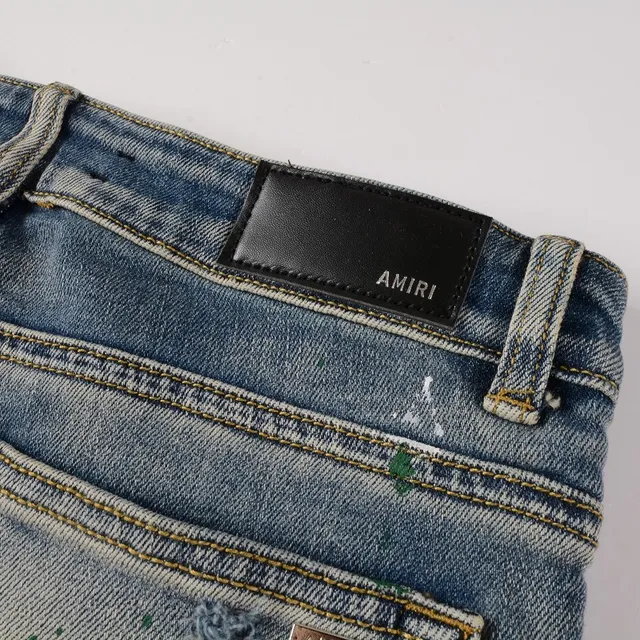 Distressed Paint-Splattered Slim-Fit Light Wash Jeans 10