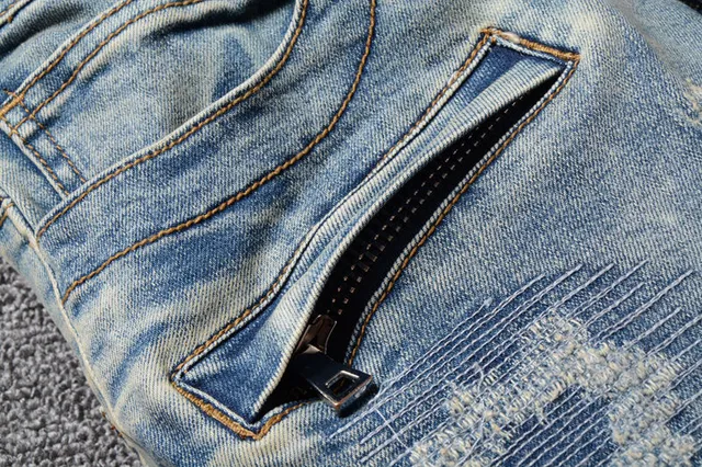 Distressed Panelled Light-Wash Blue Slim-Fit Jeans 12
