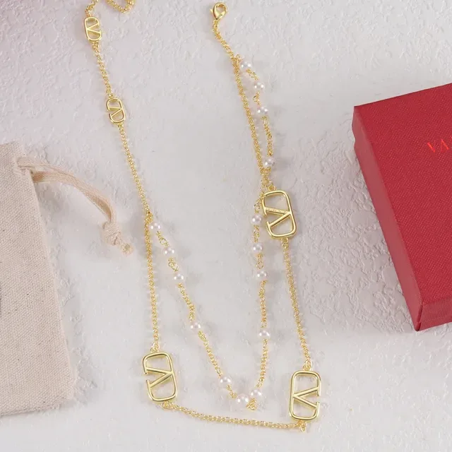 Dual-Layer Pearl and V-Charmed Chain Necklaces 3
