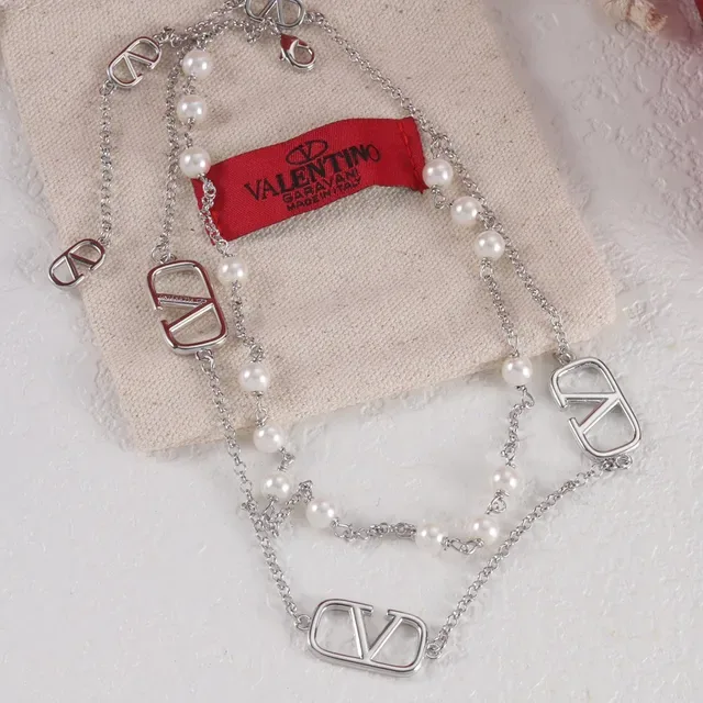 Dual-Layer Pearl and V-Charmed Chain Necklaces 4
