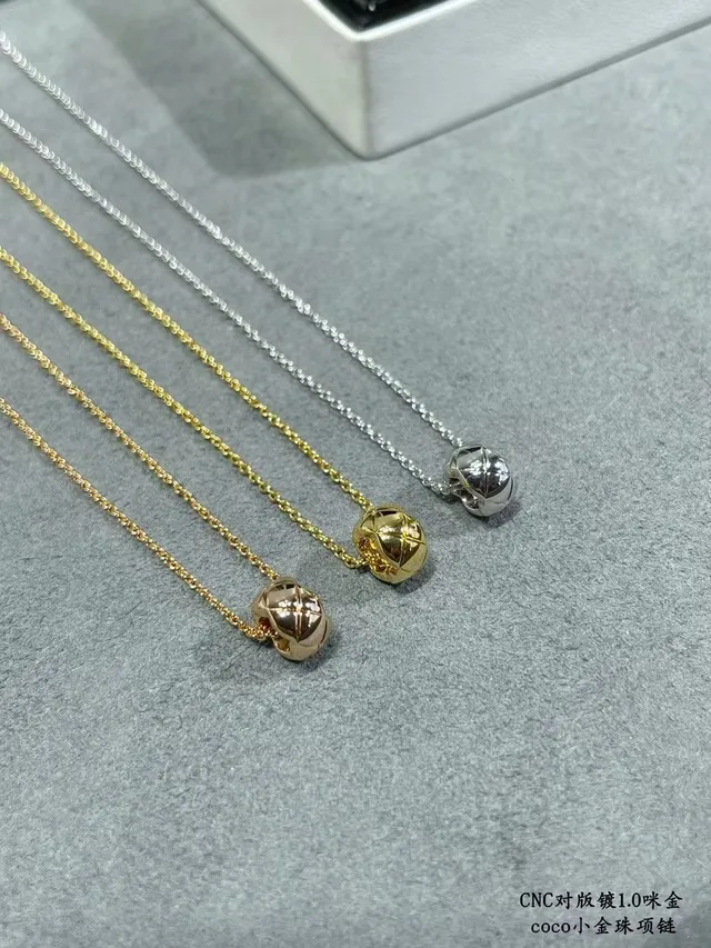 Gold Chain Geometric Knot Pendant Necklace 8
