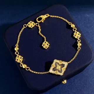 Cadena de oro y plata con motivos florales de filigrana pulsera