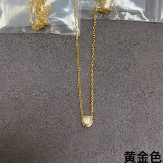 Collier pendentif pierre ronde de ton doré monté en bisel