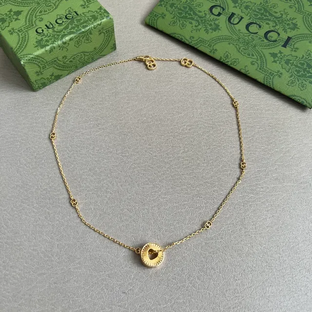 Gold-Tone Sunburst Pendant Necklace 3