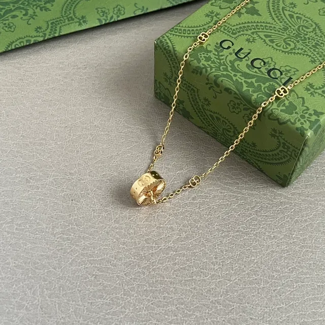 Gold-Tone Sunburst Pendant Necklace 4