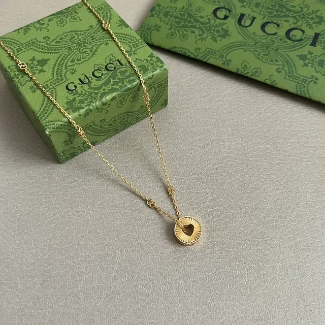Gold-Tone Sunburst Pendant Necklace 7