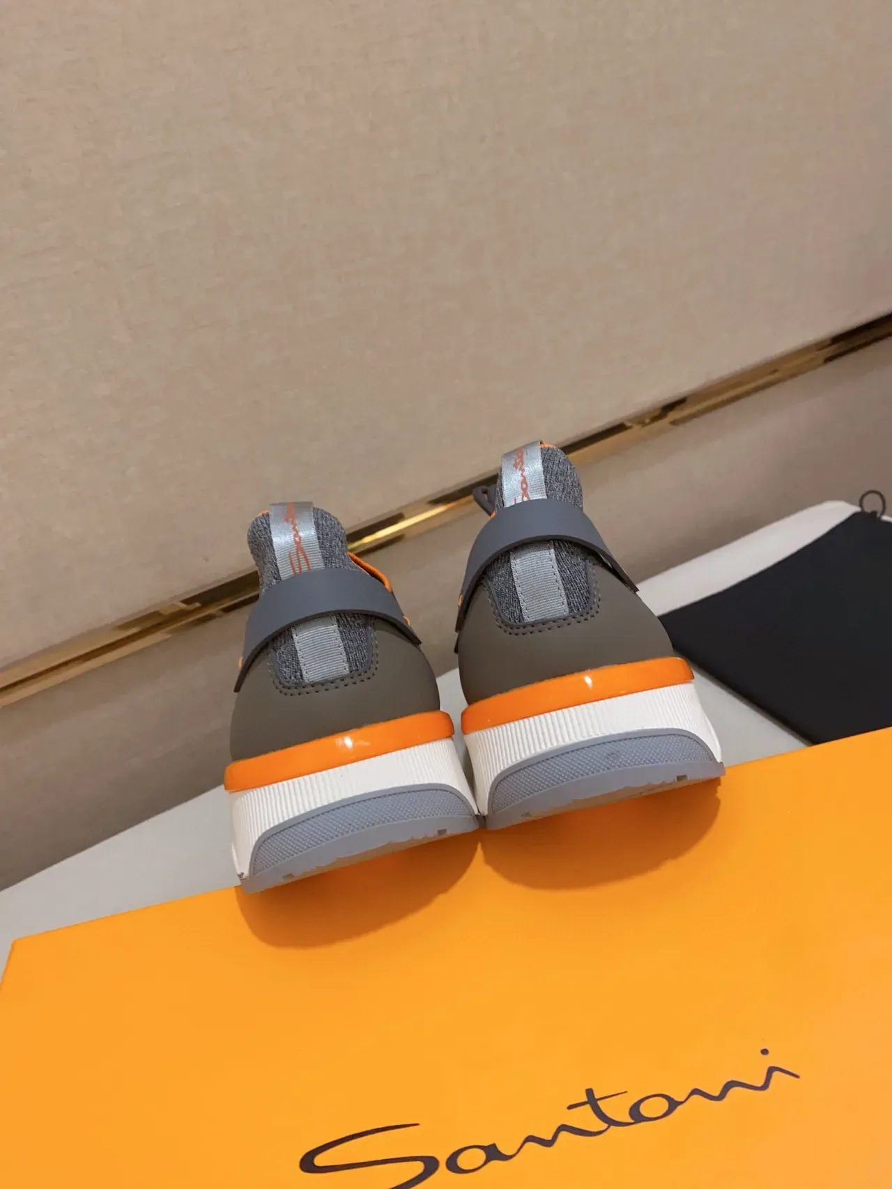 Gray and Orange Knit Upper Sculpted Midsole Sneaker 3