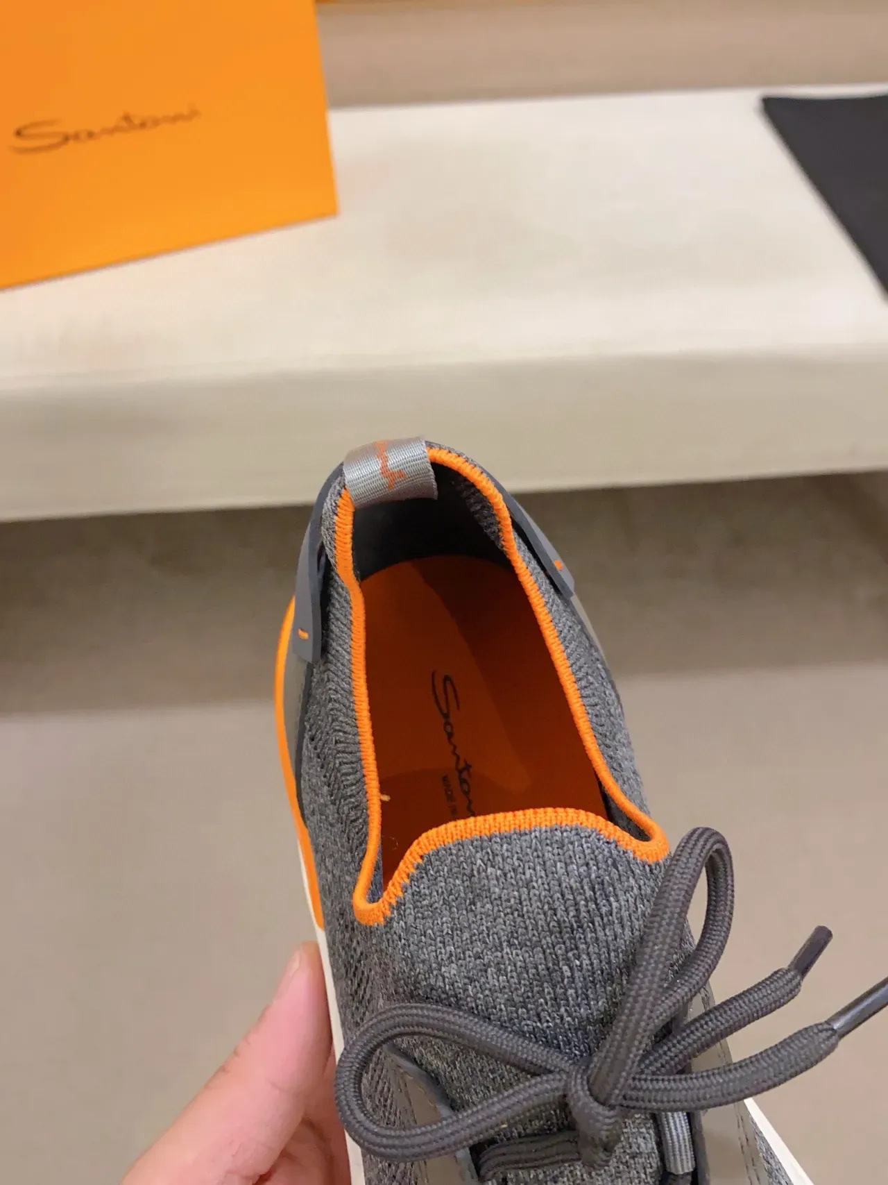 Gray and Orange Knit Upper Sculpted Midsole Sneaker 4