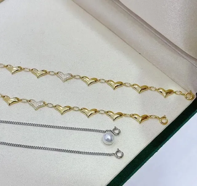 Layered Pearl and Gold-Tone Heart Motif Necklace 9