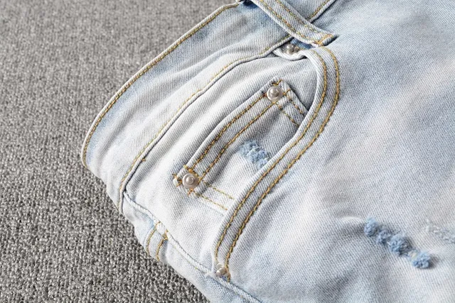 Light-Wash Distressed Slim-Fit Ripped Jeans 8