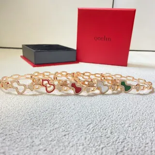 سوار Qeilin ذهبي اللون مينا قلب