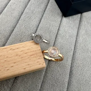 Silver and Gold Tone Rotating Diamond Halo Rings