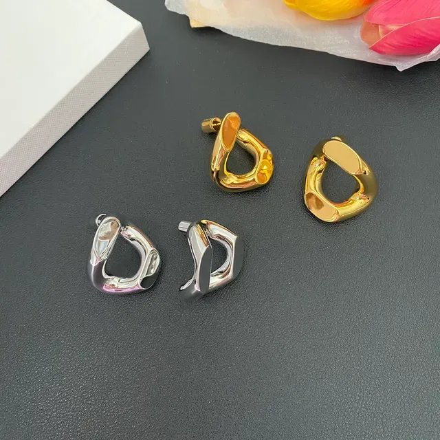 Silver Gold Sculpted Asymmetrical Hoop Polished Metallic Jewelry 9
