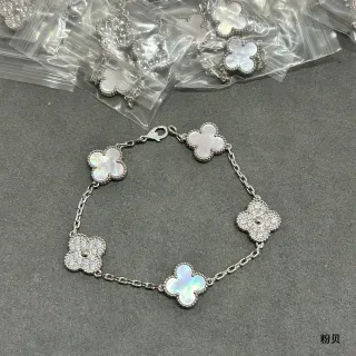 Pulsera de plata blanca con motivo de trébol de cuatro hojas incrustada con madreperla