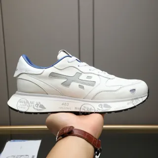 Tênis lifestyle de couro branco e azul com gola contrastante