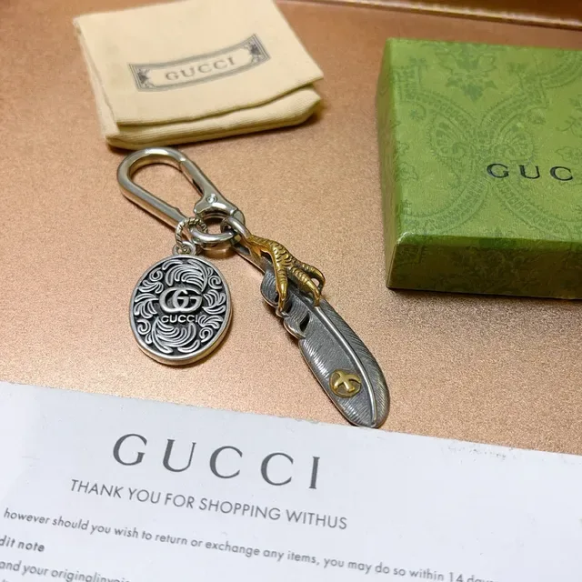 Gucci Feather Silver Gold Metal Keychain Ornate Circular Medallion Bracelet 3