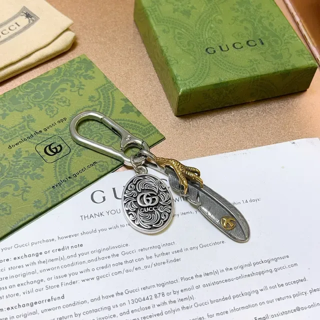 Gucci Feather Silver Gold Metal Keychain Ornate Circular Medallion Bracelet 4