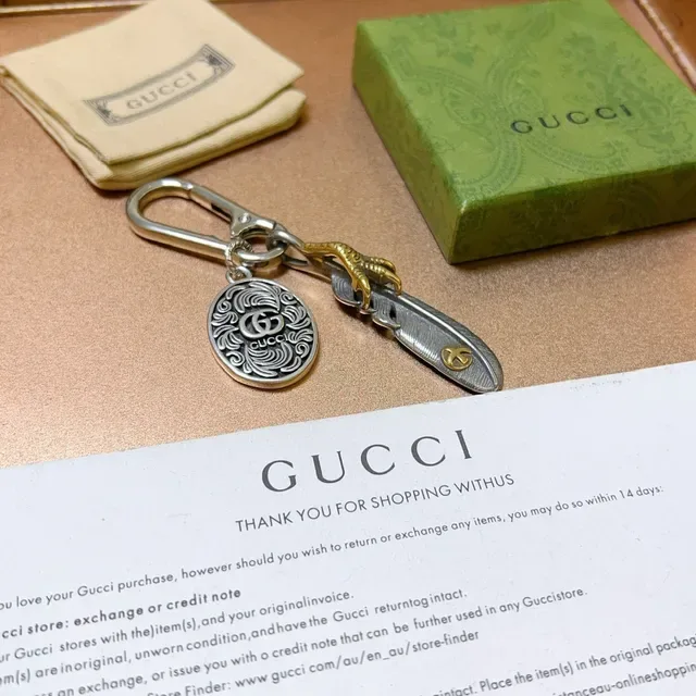 Gucci Feather Silver Gold Metal Keychain Ornate Circular Medallion Bracelet 5