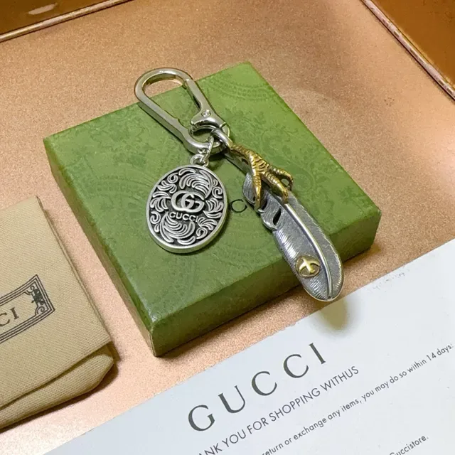 Gucci Feather Silver Gold Metal Keychain Ornate Circular Medallion Bracelet 6