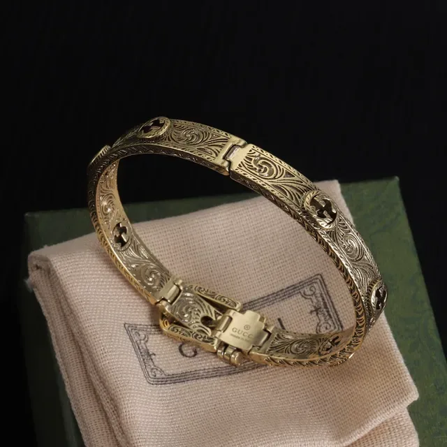 Gucci Ornate Engraved Buckle-Clasp Silver and Gold Metal Bracelets 3