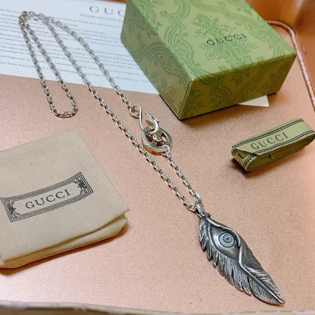Gucci Silver Gold Feather-Shaped Pendant Oxidized Finish Necklace 3