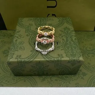Gucci Stacked Floral Motif Multi-Metal Rings