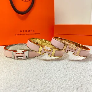 Hermès Clic H Pink Enamel Gold and Silver Tone Rigid Bracelets