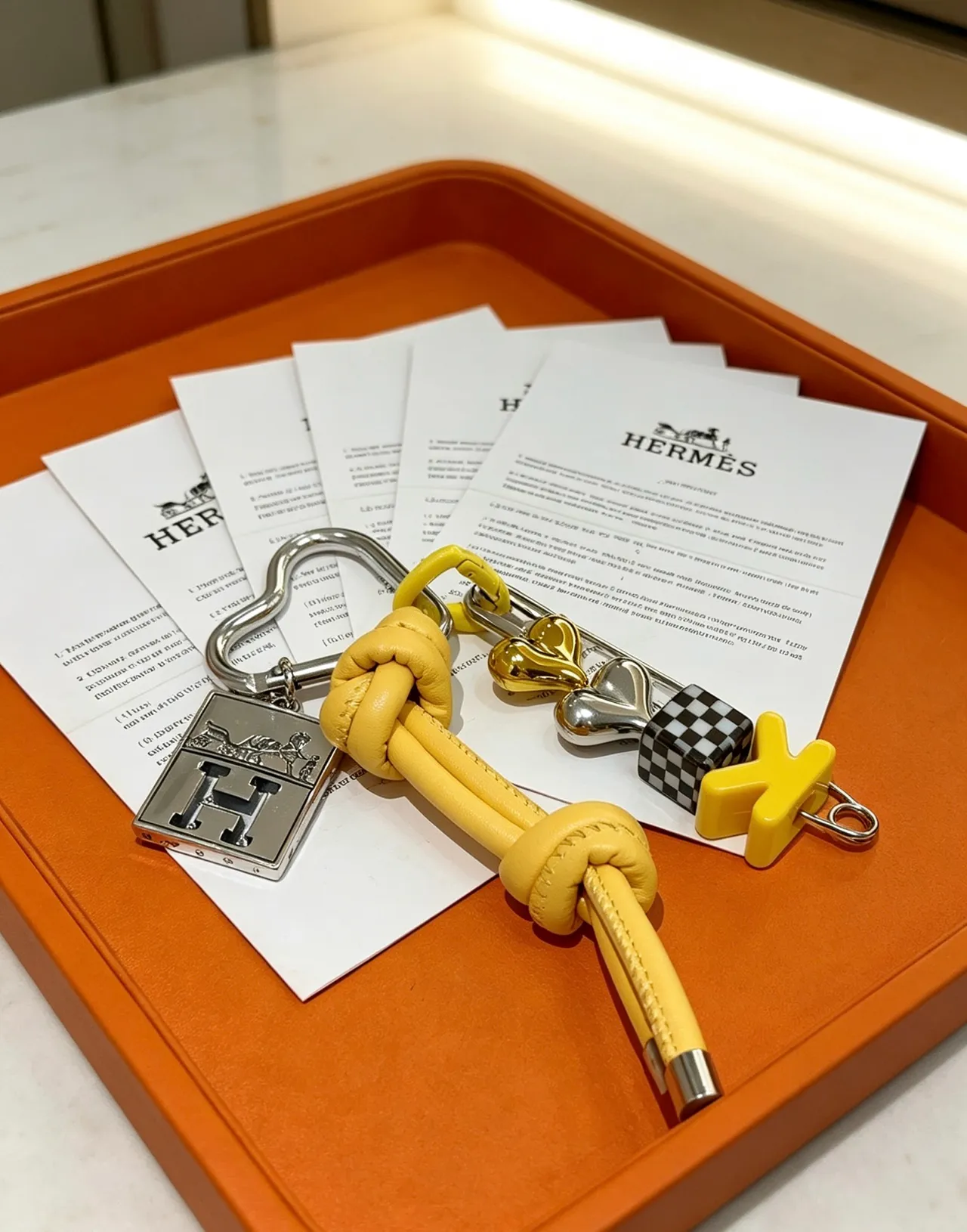 Hermès Yellow Silver Knot-Tied Leather Cord Multi-Charm Assembly Bracelet 2