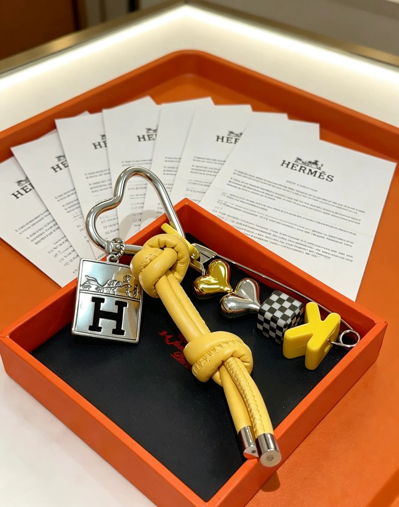 Hermès Yellow Silver Knot-Tied Leather Cord Multi-Charm Assembly Bracelet 4