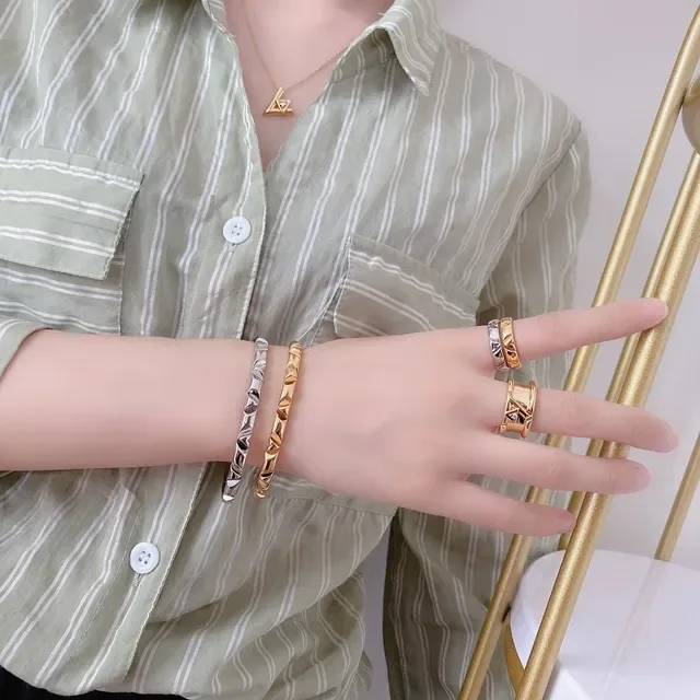 Louis Vuitton Angular V-Motif Diamond-Accented Gold and Silver Rings 2