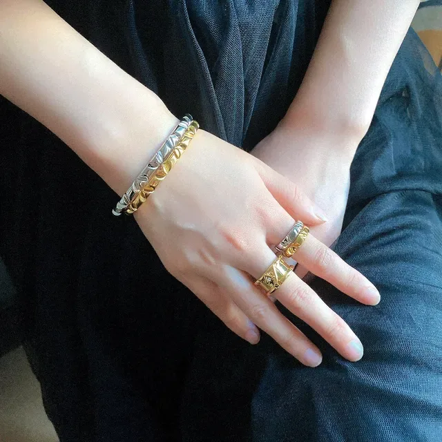 Louis Vuitton Angular V-Motif Diamond-Accented Gold and Silver Rings 3