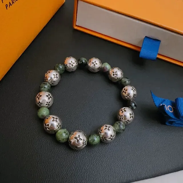 Louis Vuitton Beaded Floral-Engraved Metal and Stone Bracelet 6