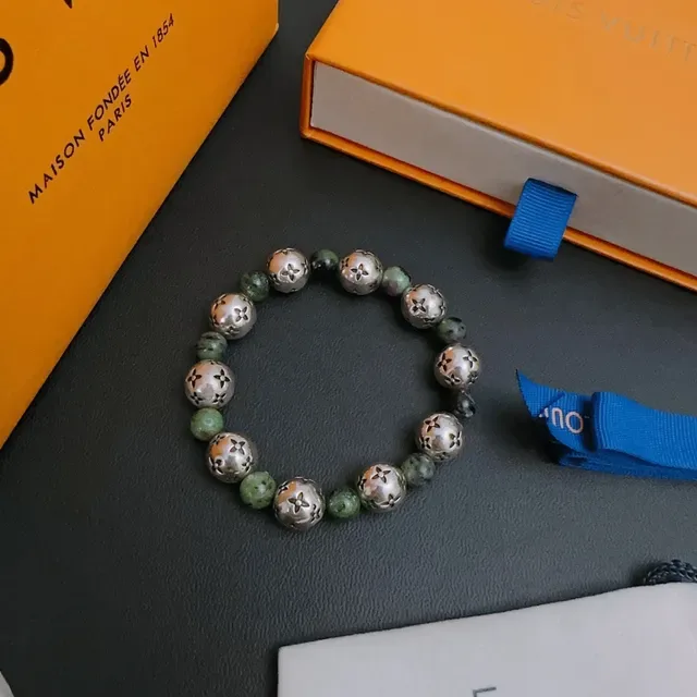 Louis Vuitton Beaded Floral-Engraved Metal and Stone Bracelet 9