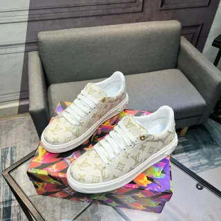 Louis Vuitton Zapatillas lifestyle de lona beige con monograma dorado de bajo