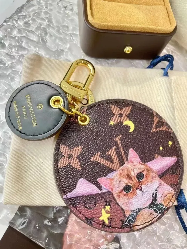 Louis Vuitton Brown Gold Circular Monogram Canvas Printed Cat Illustration Handbag 7
