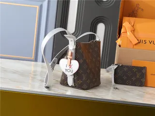 Louis Vuitton Brown White Monogram Canvas Silver-Tone Hardware Bucket Bag 9