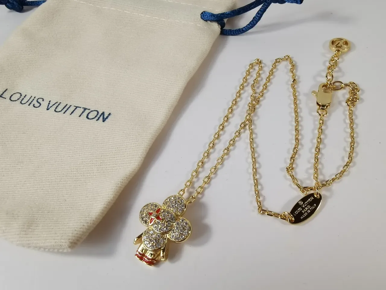 Louis Vuitton Gold-Tone Crystal Flower Pendant Necklace 4